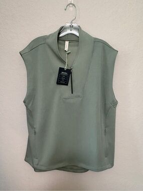 We Wander Sleeveless Quarter-Zip Tank in Sage Green